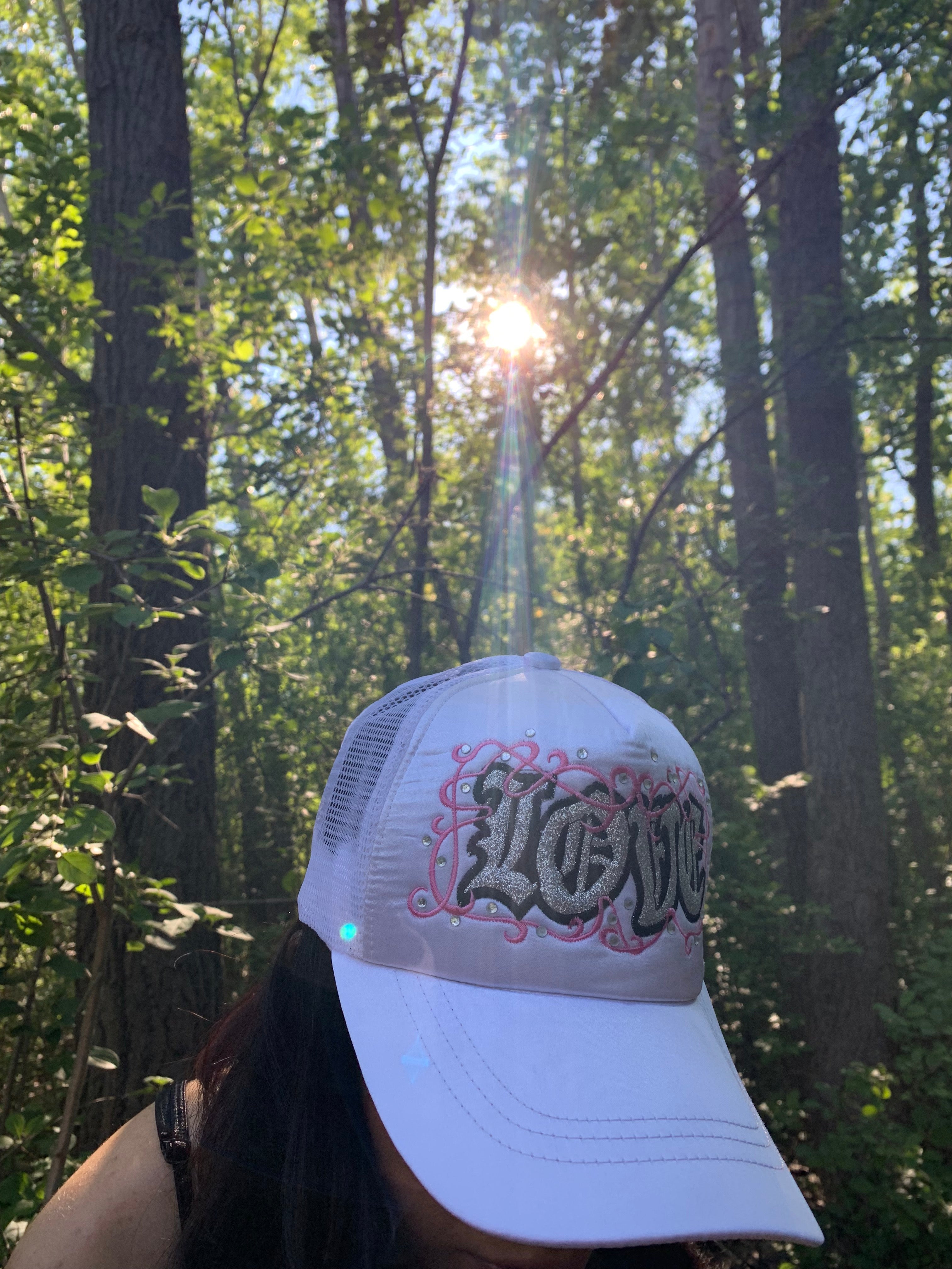 "love" trucker hat